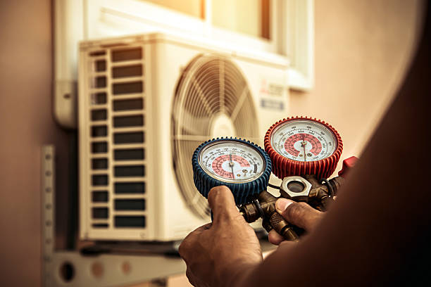 Professional Heat Pump Repair technician working in Pollok, TX